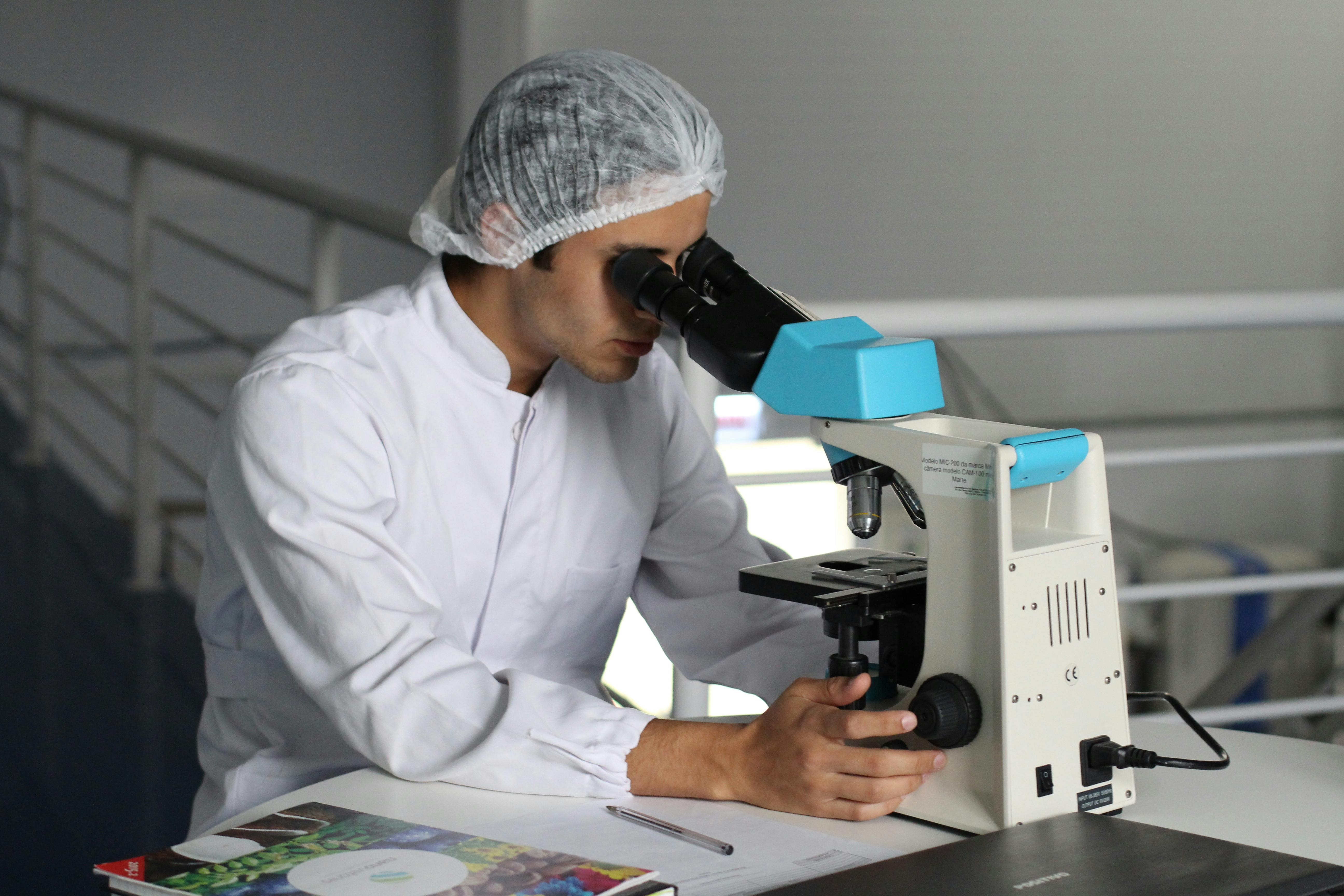 Laboratory professionals working with advanced equipment